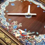 ساعت خاتم کاری طرح تذهیب گل و مرغ